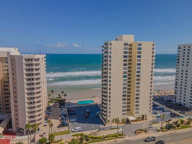 aerial view with a view of the beach and a water view