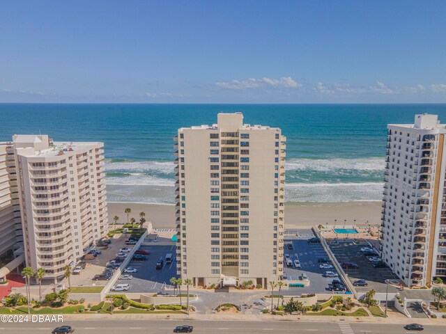 bird's eye view with a beach view and a water view