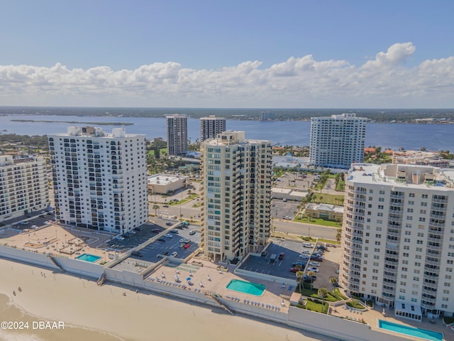 drone / aerial view with a water view