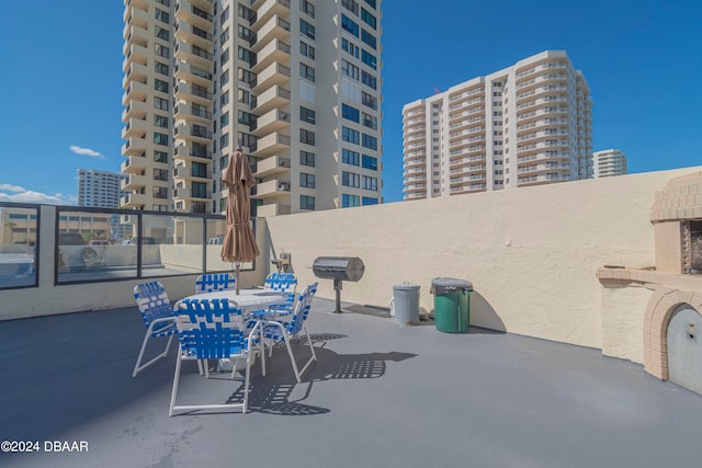 view of patio with a balcony