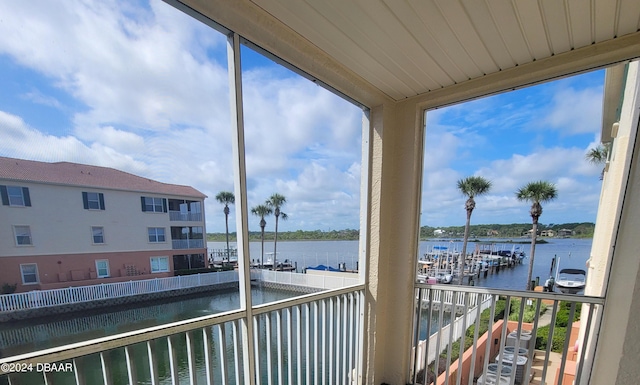 sunroom with a water view