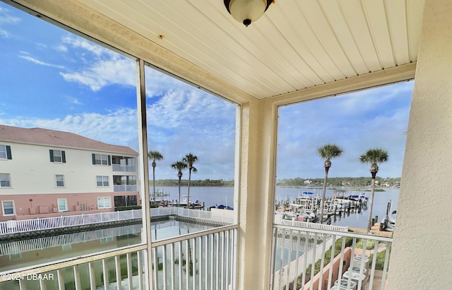 sunroom with a water view