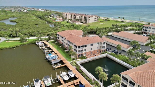 bird's eye view with a water view