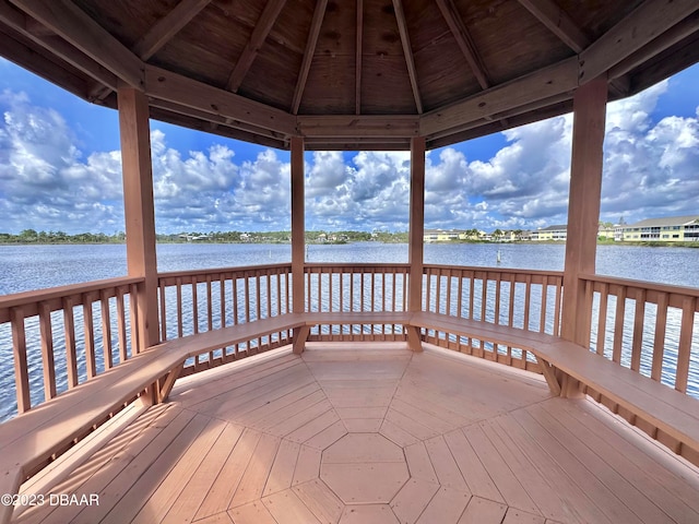 exterior space with a gazebo and a water view