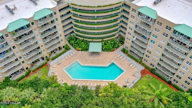 view of swimming pool with a patio