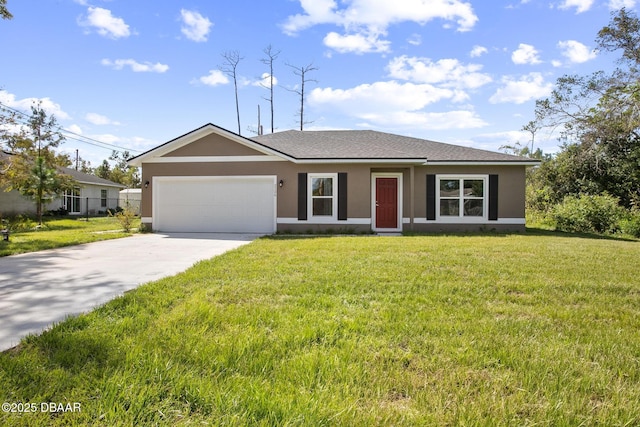 ranch-style house featuring a front yard and a garage