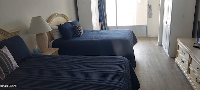 bedroom featuring light hardwood / wood-style flooring