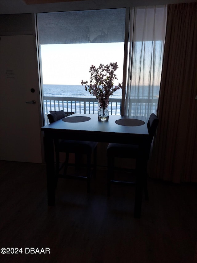 dining room with a water view