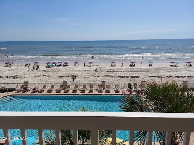 property view of water featuring a beach view