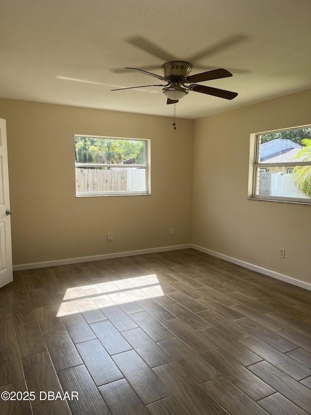 913 New Castle Ct, Holly Hill, FL 32117 - empty room featuring wood tiled floors and a ceiling fan