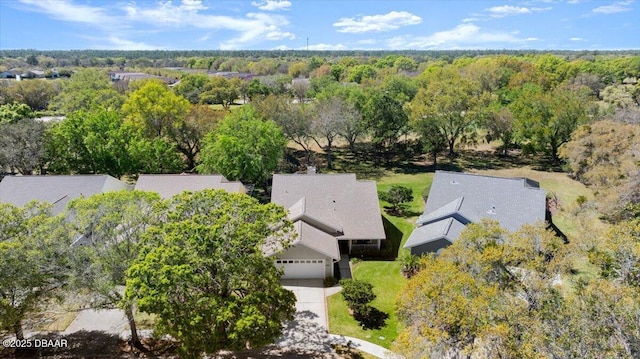 3356 Newbliss Cir, Ormond Beach, FL 32174 - drone / aerial view featuring a view of trees