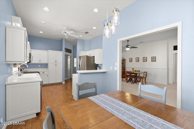 3356 Newbliss Cir, Ormond Beach, FL 32174 - dining room featuring recessed lighting, light wood-style floors, and a ceiling fan