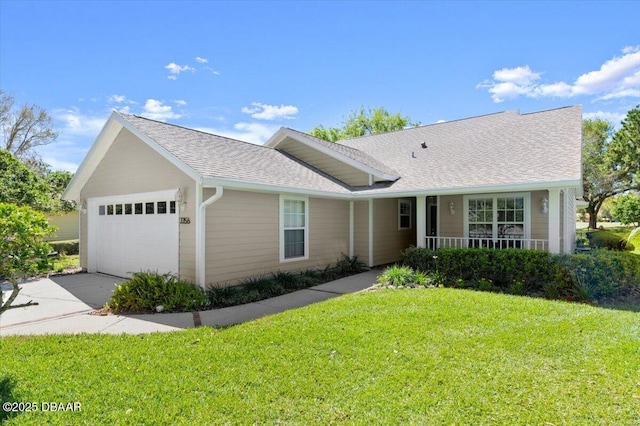 3356 Newbliss Cir, Ormond Beach, FL 32174 - ranch-style home with a front lawn, a garage, driveway, and a shingled roof