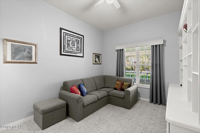 3356 Newbliss Cir, Ormond Beach, FL 32174 - living room with light colored carpet, baseboards, and a ceiling fan