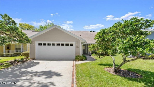 3356 Newbliss Cir, Ormond Beach, FL 32174 - ranch-style home featuring a front yard, concrete driveway, and an attached garage