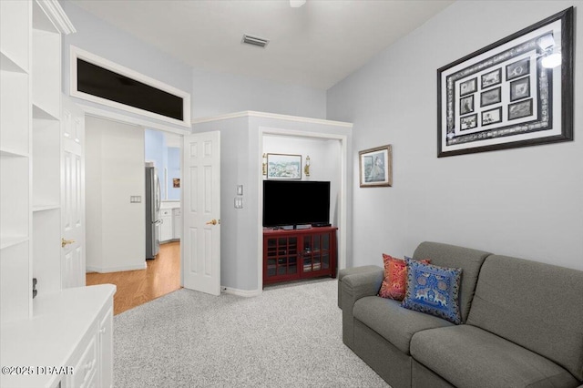 3356 Newbliss Cir, Ormond Beach, FL 32174 - living room featuring visible vents and light colored carpet