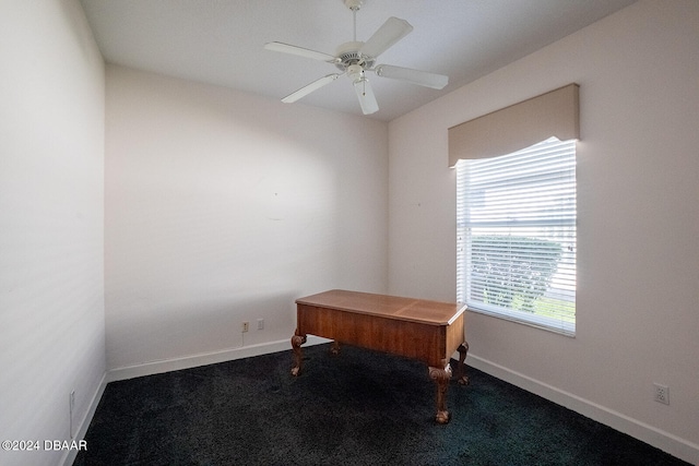 office area with carpet and ceiling fan