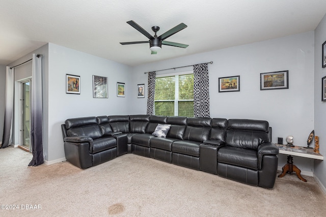 living room featuring ceiling fan and carpet floors