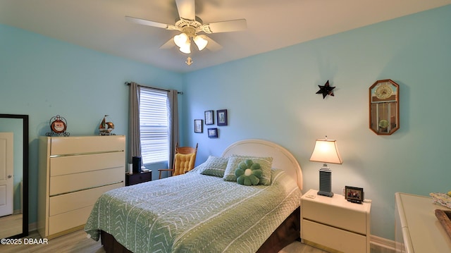 551 Armoyan Way, New Smyrna Beach, FL 32168 - bedroom featuring wood finished floors and a ceiling fan