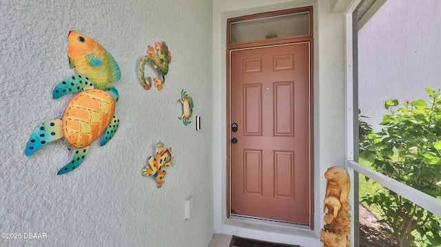551 Armoyan Way, New Smyrna Beach, FL 32168 - entrance to property featuring stucco siding