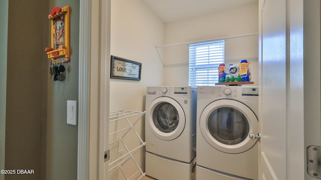 551 Armoyan Way, New Smyrna Beach, FL 32168 - washroom featuring washing machine and clothes dryer
