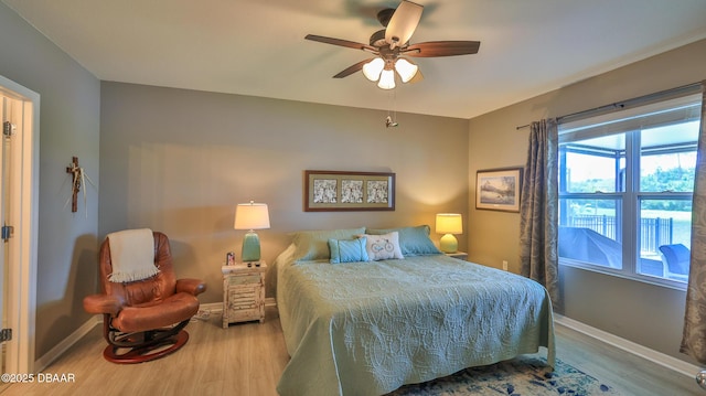 551 Armoyan Way, New Smyrna Beach, FL 32168 - bedroom featuring wood finished floors and a ceiling fan