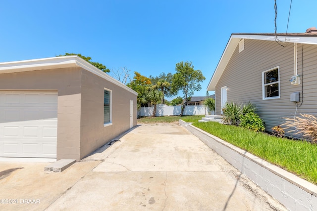 view of home's exterior with a garage