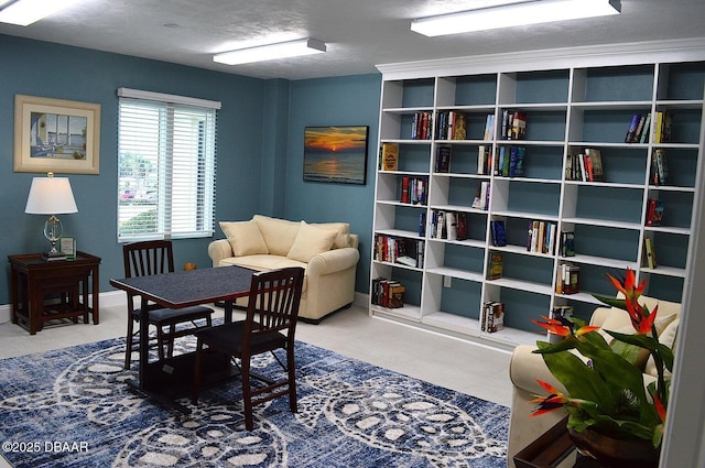 3333 S Atlantic Ave Unit 605, Daytona Beach, FL 32118 - living area featuring baseboards