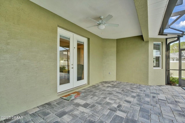 25 Egret Trl, Palm Coast, FL 32164 - view of patio / terrace with french doors, ceiling fan, and glass enclosure