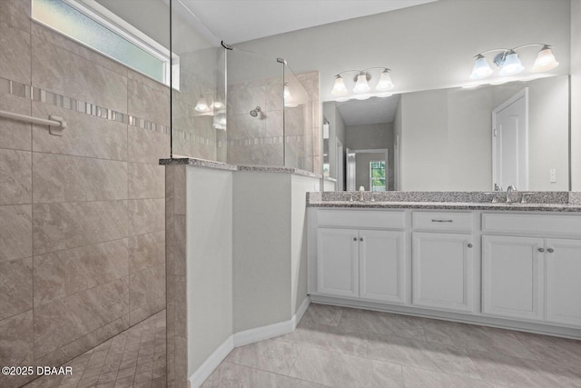 25 Egret Trl, Palm Coast, FL 32164 - bathroom with a walk in shower and double vanity
