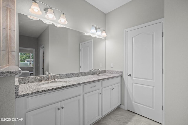 25 Egret Trl, Palm Coast, FL 32164 - bathroom featuring double vanity and connected bathroom
