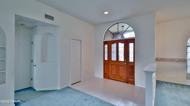 view of carpeted entryway