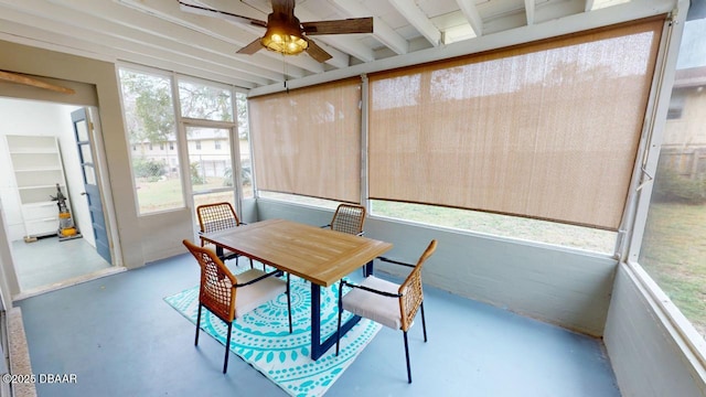 sunroom featuring a wealth of natural light and ceiling fan