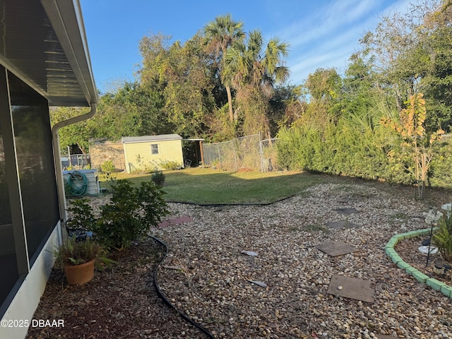 view of yard with a storage shed