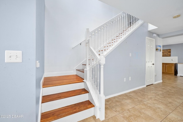 5 Cantilever Ct, Ormond Beach, FL 32174 - stairs with tile patterned flooring and baseboards