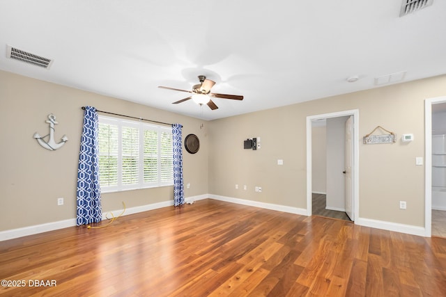 5 Cantilever Ct, Ormond Beach, FL 32174 - spare room with a ceiling fan, wood finished floors, and baseboards