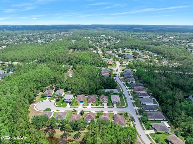 5 Cantilever Ct, Ormond Beach, FL 32174 - aerial view of property and surrounding area featuring nearby suburban area, a forest, and a large body of water