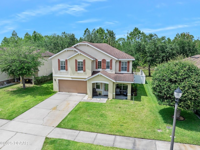 5 Cantilever Ct, Ormond Beach, FL 32174 - traditional home with an attached garage, stucco siding, concrete driveway, and a front yard