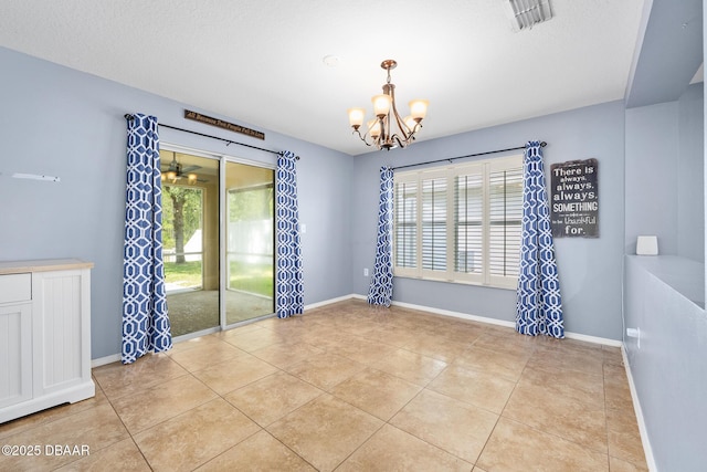 5 Cantilever Ct, Ormond Beach, FL 32174 - empty room with a chandelier, light tile patterned floors, and baseboards