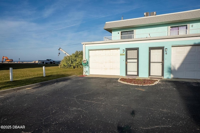 garage with a yard