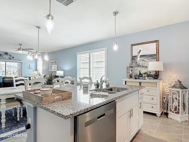 2778 Portadown St, Ormond Beach, FL 32174 - kitchen featuring stainless steel dishwasher, a ceiling fan, a sink, open floor plan, and visible vents