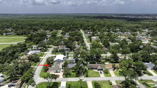 952 Northbrook Dr, Ormond Beach, FL 32174 - aerial overview of property's location featuring a heavily wooded area and nearby suburban area