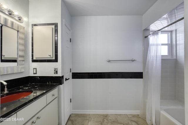 952 Northbrook Dr, Ormond Beach, FL 32174 - bathroom with vanity, shower / tub combo, and tile patterned floors