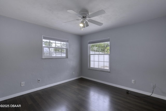 952 Northbrook Dr, Ormond Beach, FL 32174 - unfurnished room with baseboards, dark wood-style flooring, and ceiling fan
