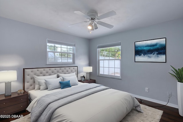 952 Northbrook Dr, Ormond Beach, FL 32174 - bedroom featuring baseboards, dark wood-style floors, and a ceiling fan