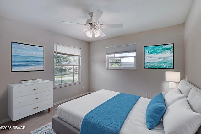 952 Northbrook Dr, Ormond Beach, FL 32174 - carpeted bedroom with a ceiling fan and baseboards