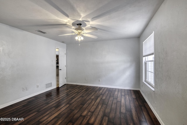 952 Northbrook Dr, Ormond Beach, FL 32174 - empty room featuring a ceiling fan, dark wood-type flooring, baseboards, and a textured wall