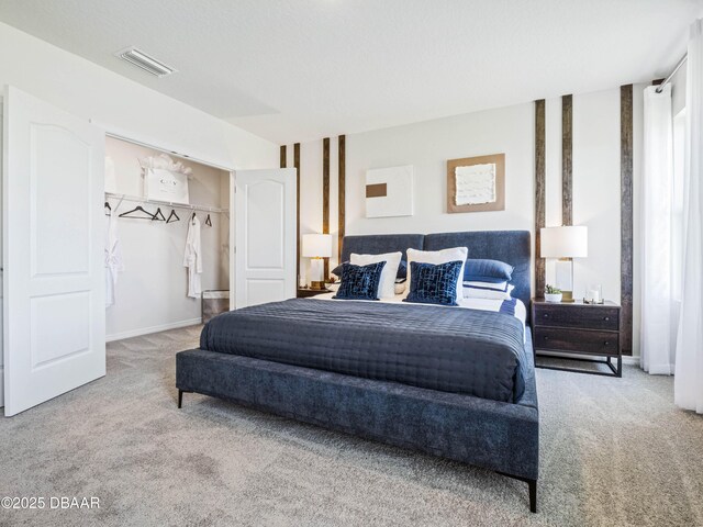 2716 Golden Trout Ln, Edgewater, FL 32141 - carpeted bedroom with a walk in closet