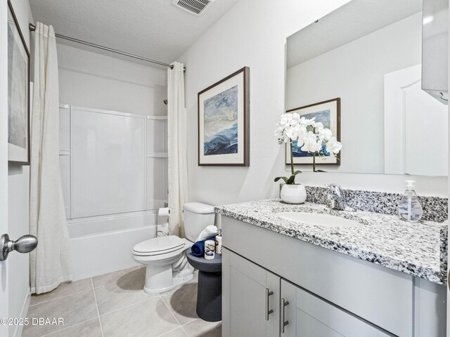 2716 Golden Trout Ln, Edgewater, FL 32141 - full bathroom featuring vanity, shower / bath combo with shower curtain, and tile patterned flooring