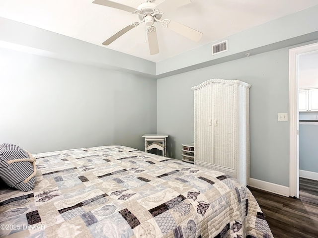 bedroom featuring hardwood / wood-style flooring and ceiling fan